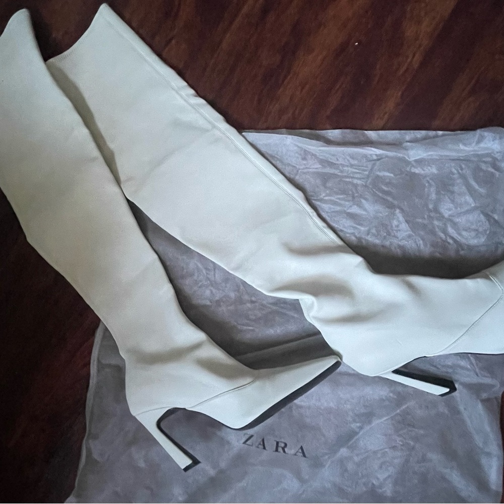 White knee high boots